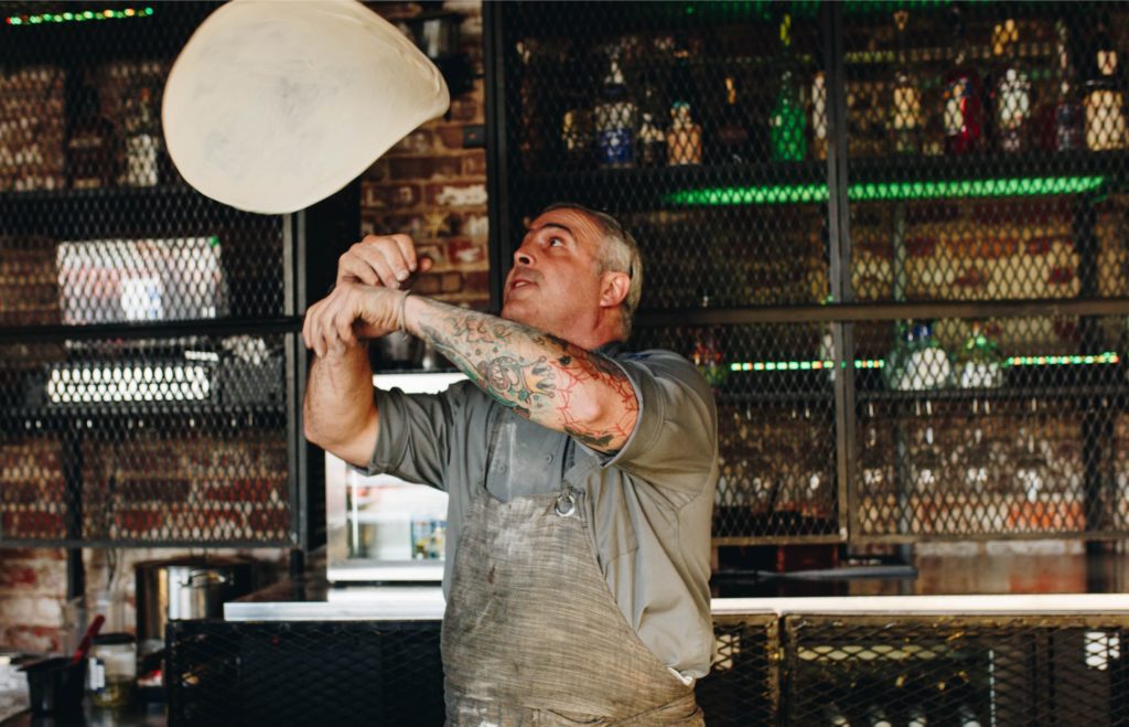 Wood Fired Pizza at Mulino Italian Kitchen & Bar. Photography By Jamie Robbins.