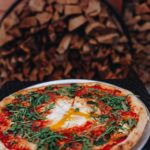 Pizza at Mulino Italian Kitchen & Bar. Photography By Jamie Robbins.
